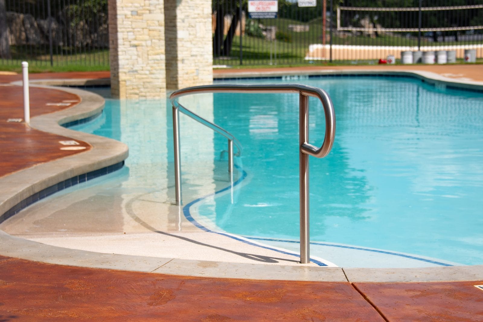Cable railing around a pool deck